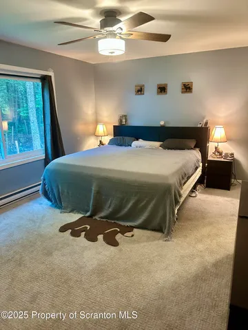 a bath room with a white couch