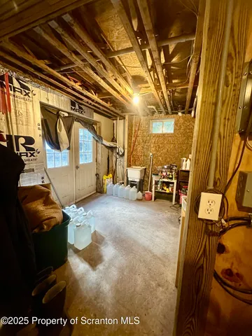 a view of a patio with table and chairs