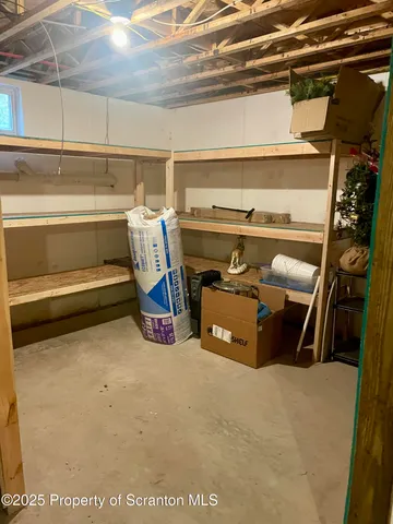 a view of a backyard with sitting area