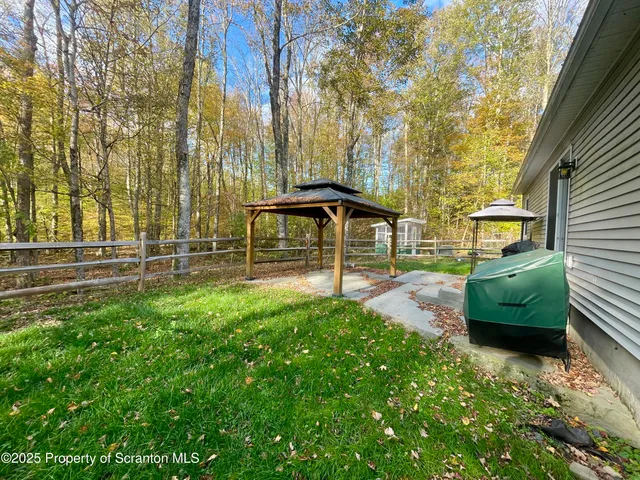 a view of a garden with a bench