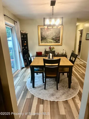 a bedroom with a bed and a mirror