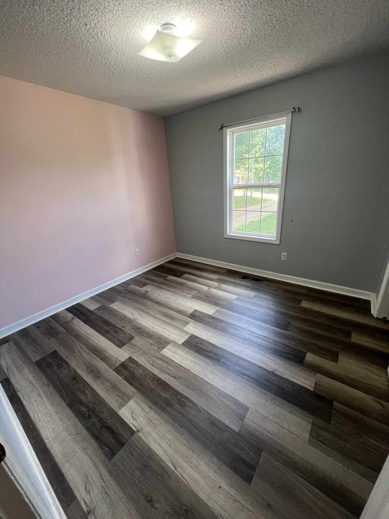 149 Hawthorne Street Pulaski, TN 38478 - Photo 22 of 33 a view of an empty room and window
