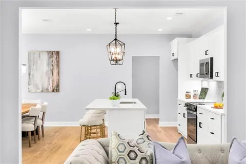 a living room with furniture and decor