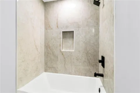 a bathroom with a bathtub
