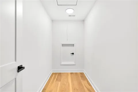 a view of a room with a window