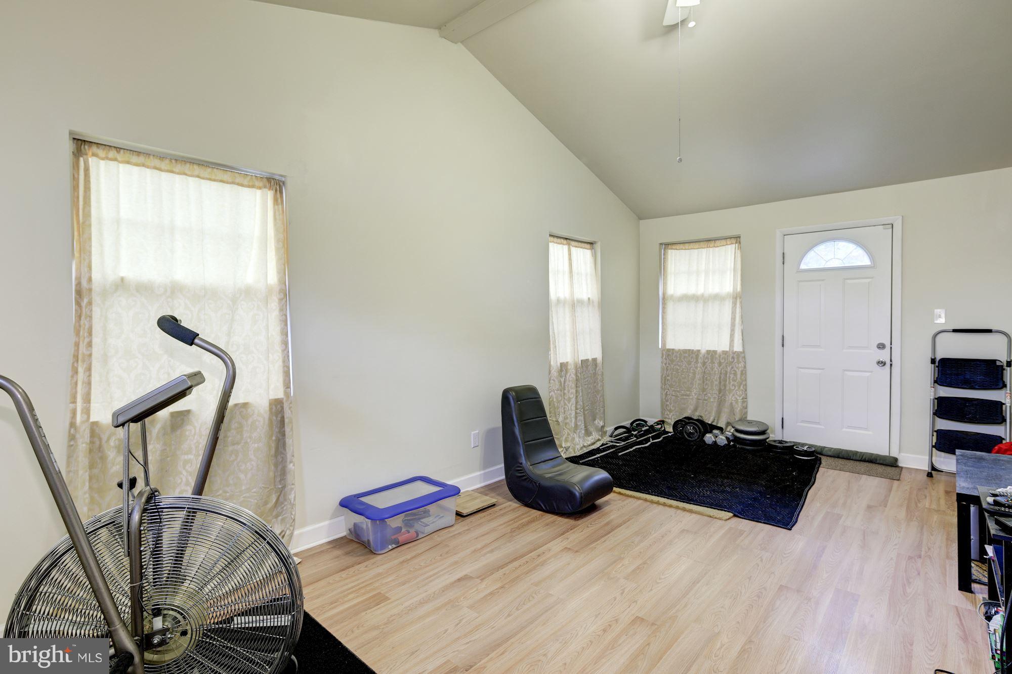 5905 Johnnycake Road Baltimore, MD 21228 - Photo 15 of 30 a room with a bed and a window
