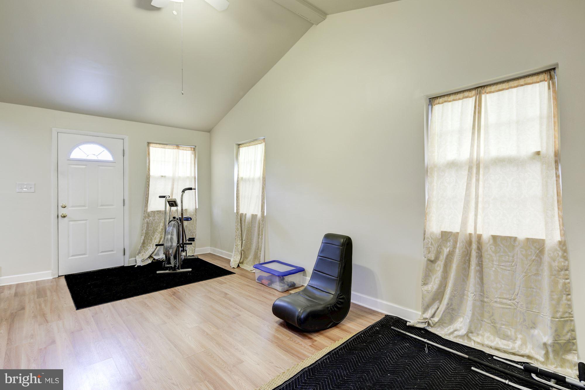 5905 Johnnycake Road Baltimore, MD 21228 - Photo 18 of 30 a room with a bed and a window