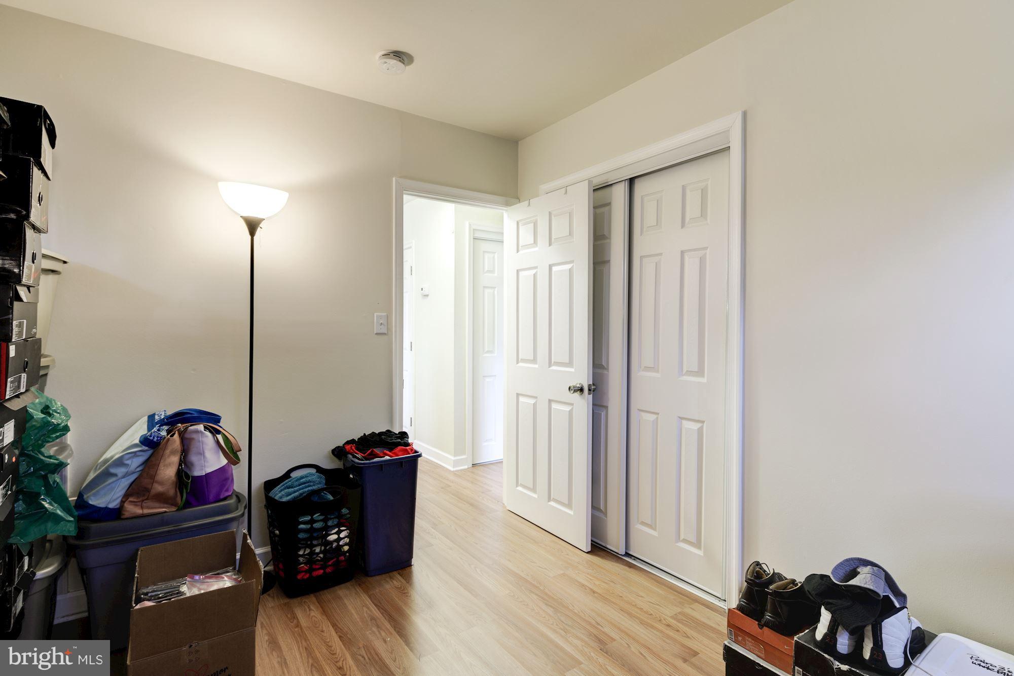5905 Johnnycake Road Baltimore, MD 21228 - Photo 25 of 30 a view of a workspace with furniture and wooden floor