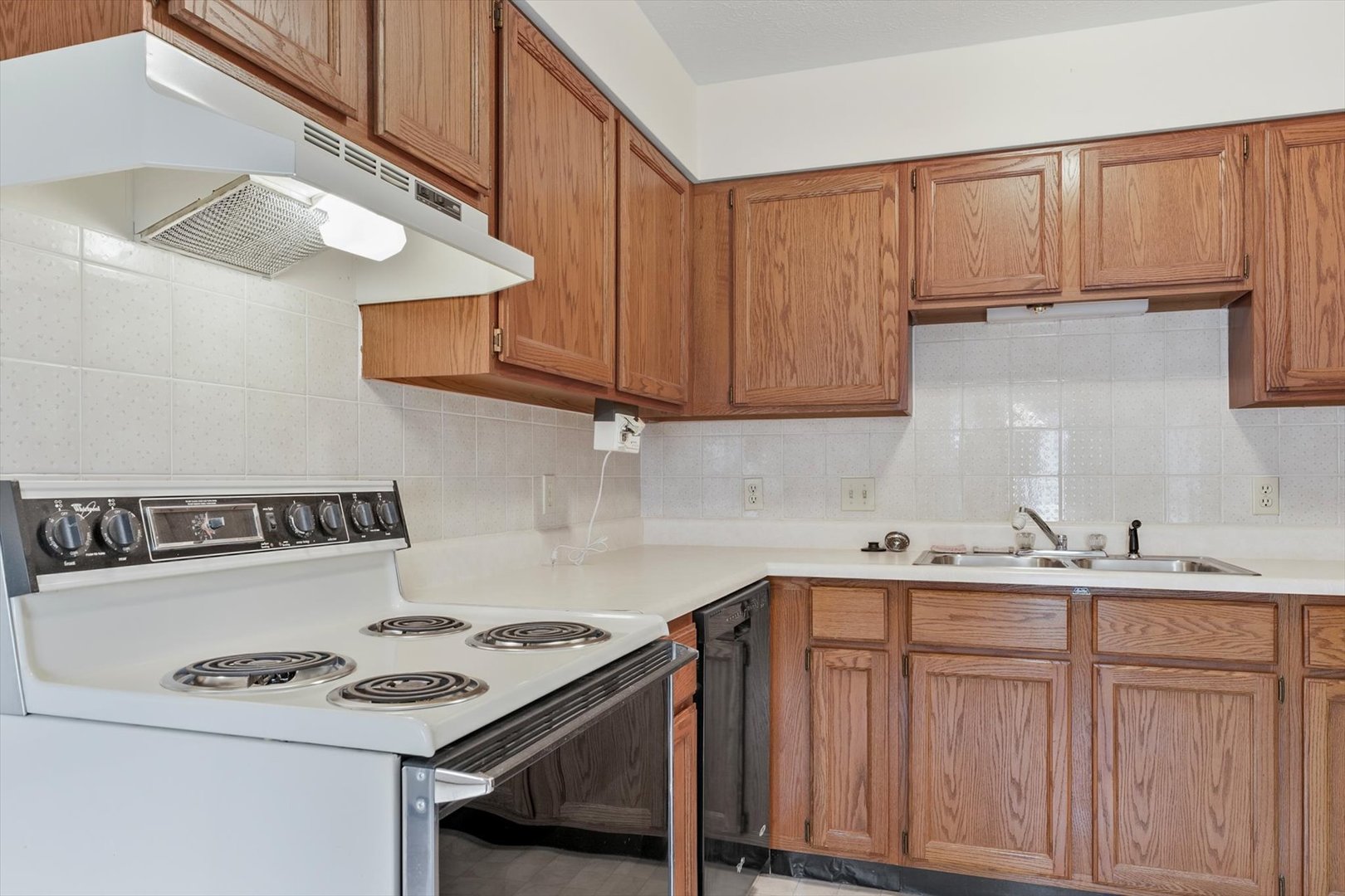2016 Tracy Drive, Unit 3 Saybrook, IL 61770 - Photo 16 of 29 a kitchen with stainless steel appliances a stove a sink and a refrigerator
