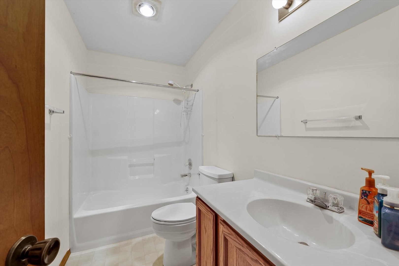 2016 Tracy Drive, Unit 3 Saybrook, IL 61770 - Photo 18 of 29 a bathroom with a sink toilet vanity and shower