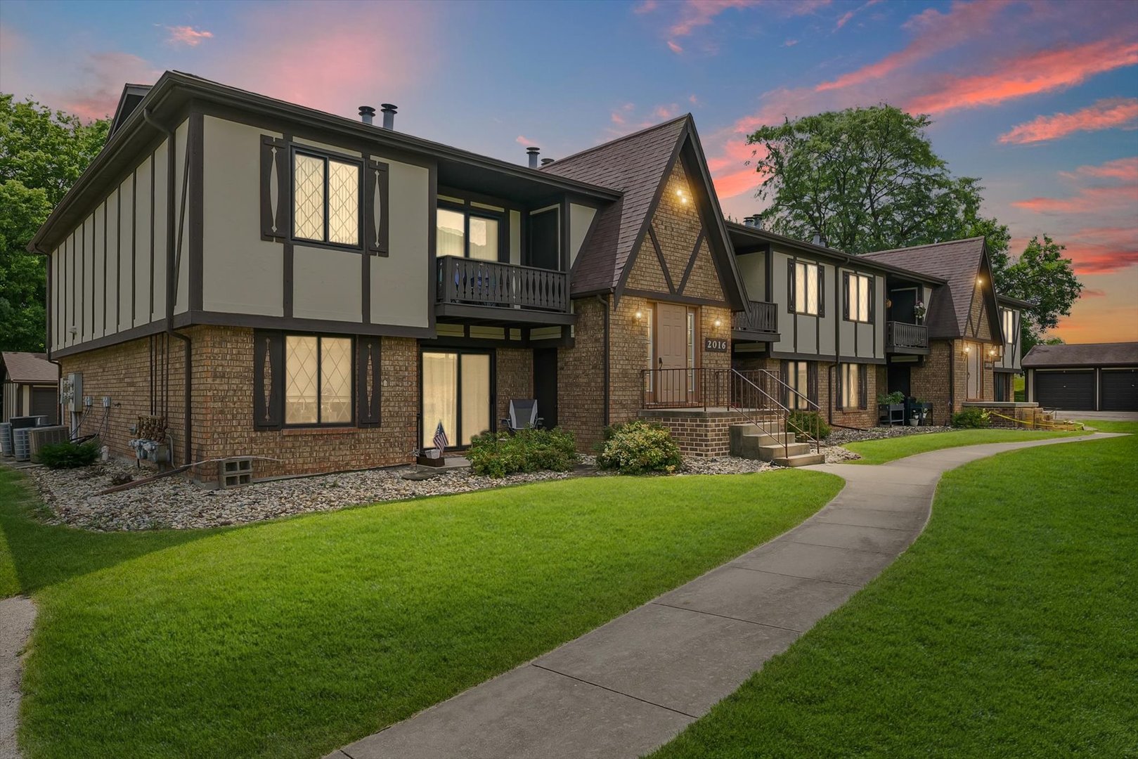 2016 Tracy Drive, Unit 3 Saybrook, IL 61770 - Photo 2 of 29 a front view of a house with a yard