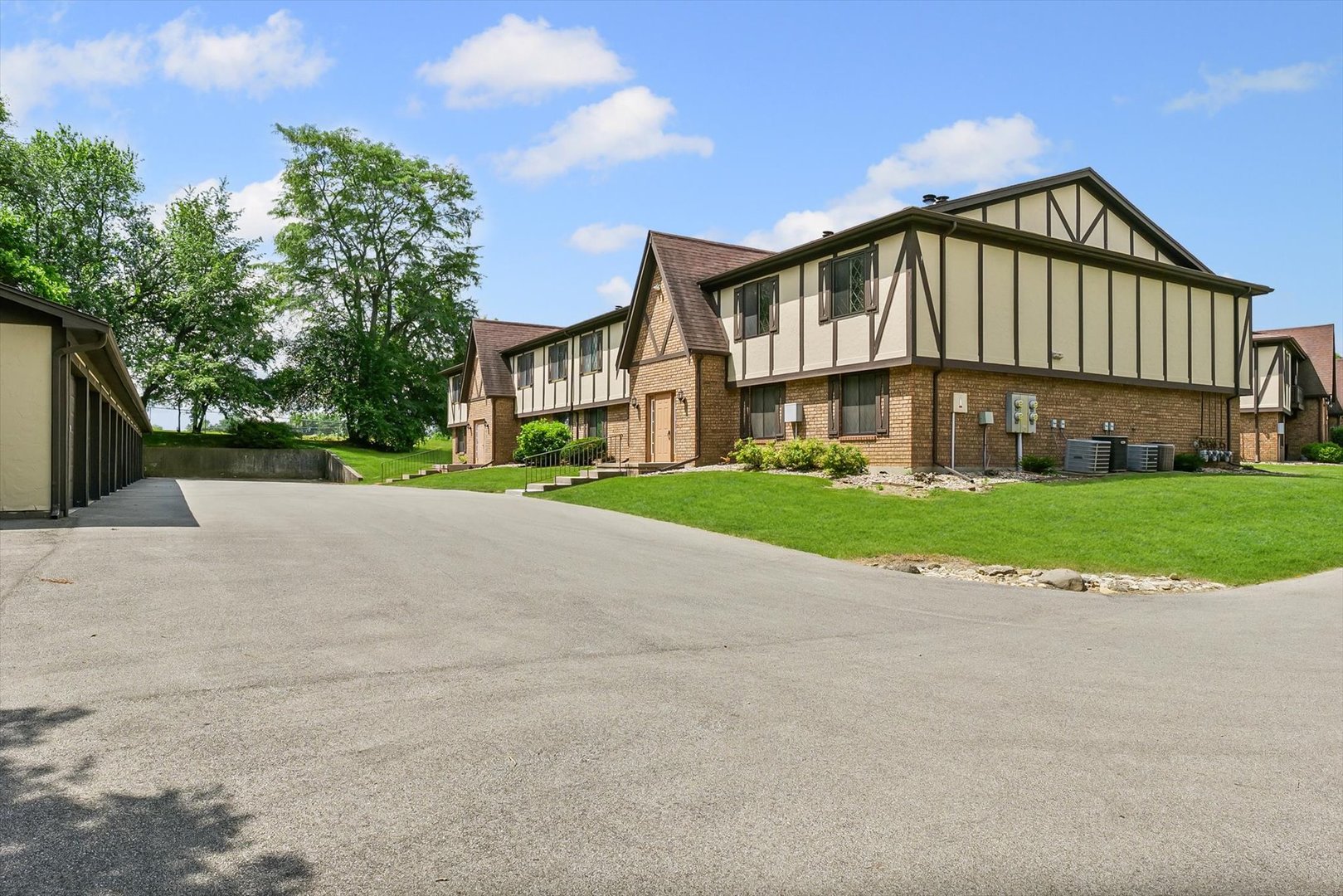 2016 Tracy Drive, Unit 3 Saybrook, IL 61770 - Photo 3 of 29 a view of house with yard and green space
