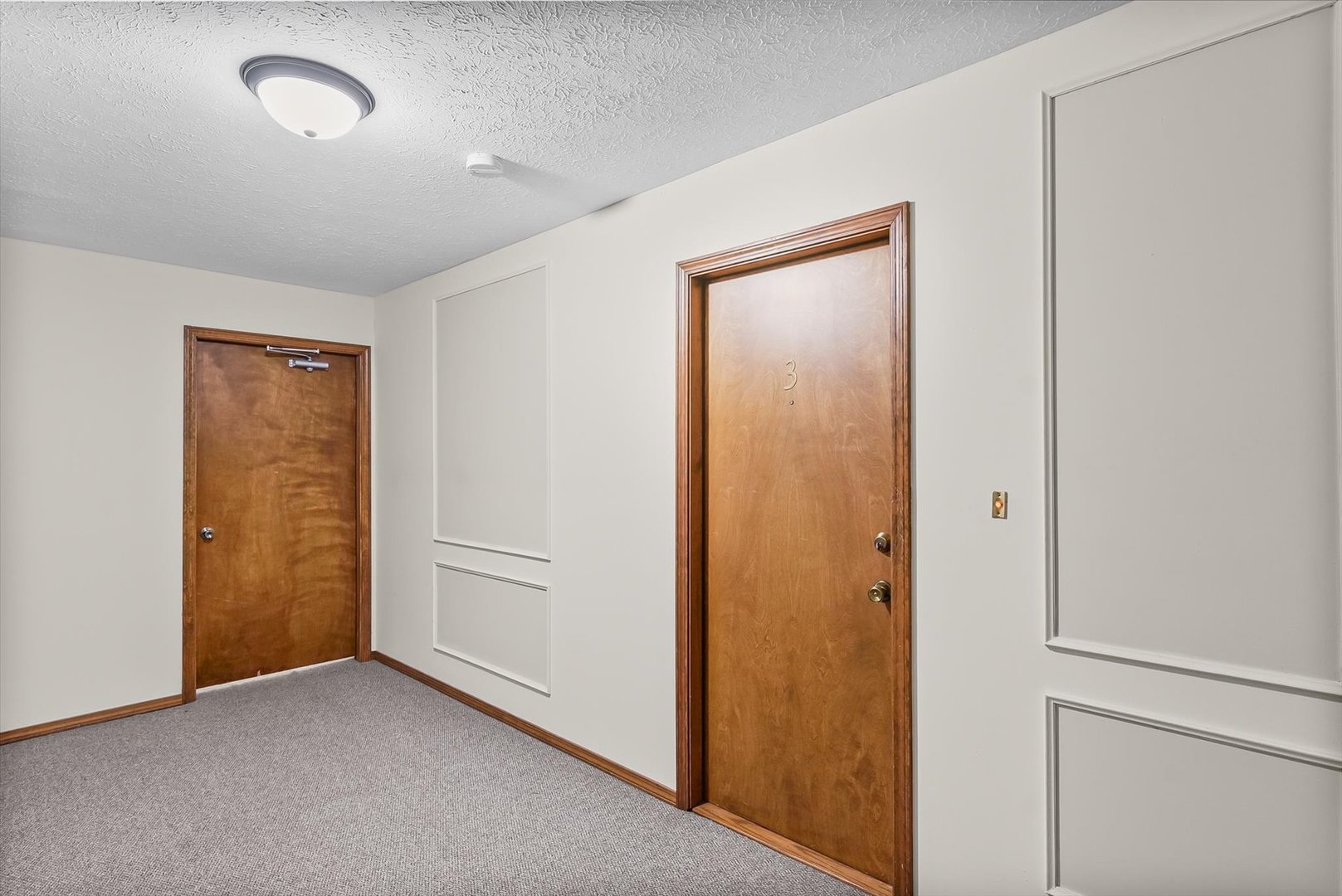 2016 Tracy Drive, Unit 3 Saybrook, IL 61770 - Photo 5 of 29 an empty room with closet area