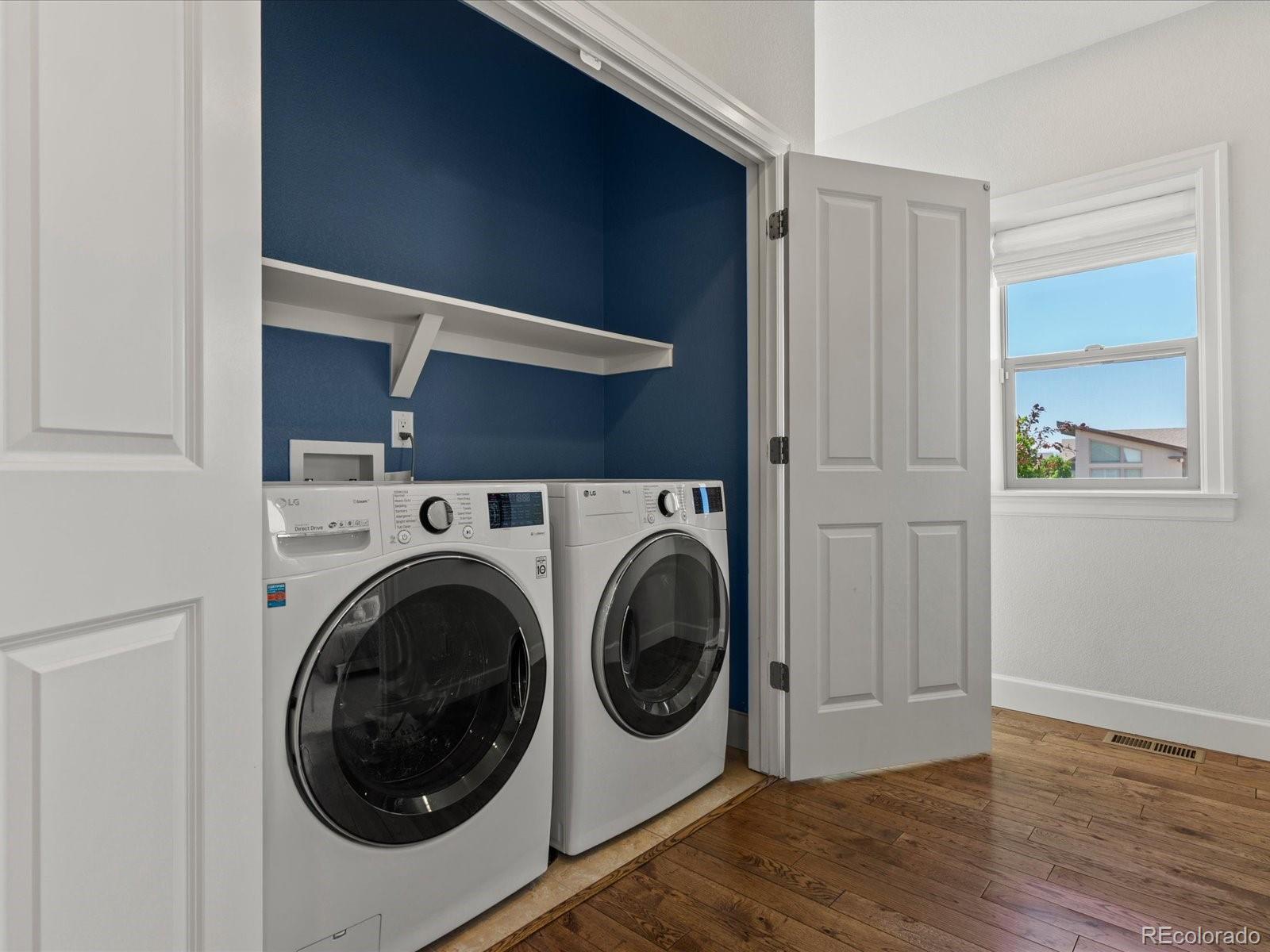 5446 Uinta Way Denver, CO 80238 - Photo 20 of 49 a utility room with dryer and washer