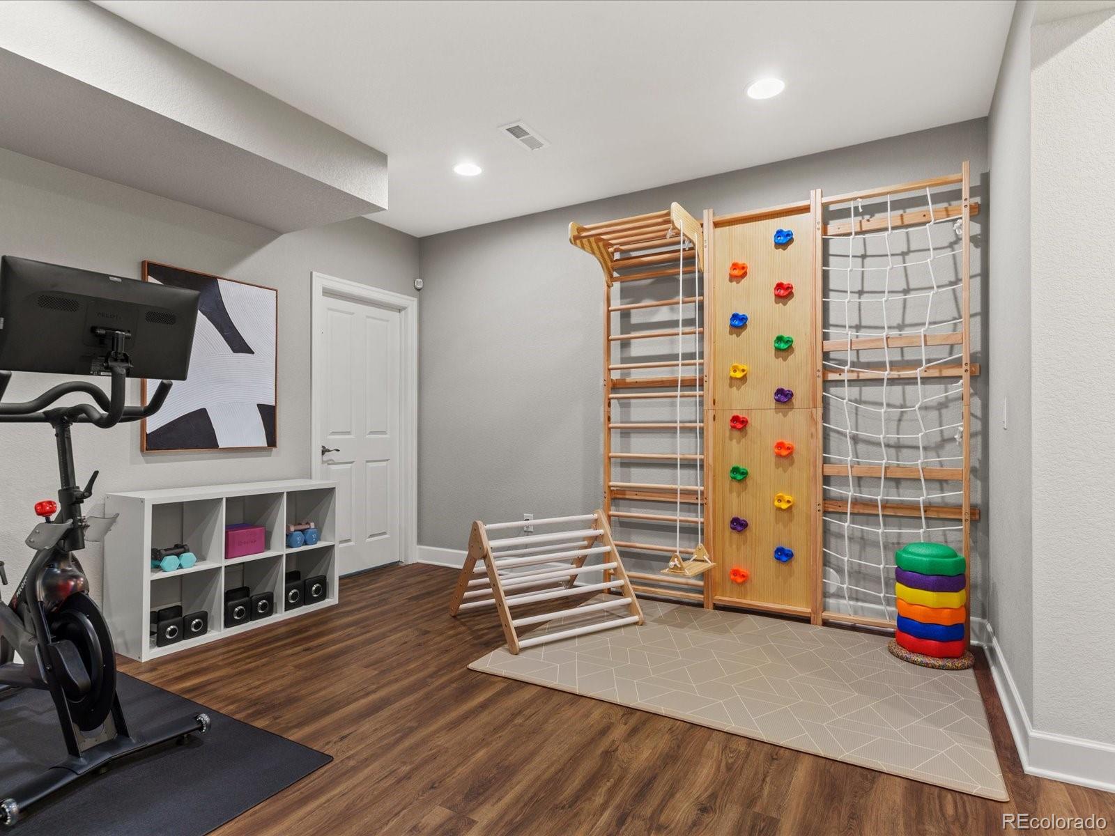 5446 Uinta Way Denver, CO 80238 - Photo 34 of 49 a view of a room with toys and toys