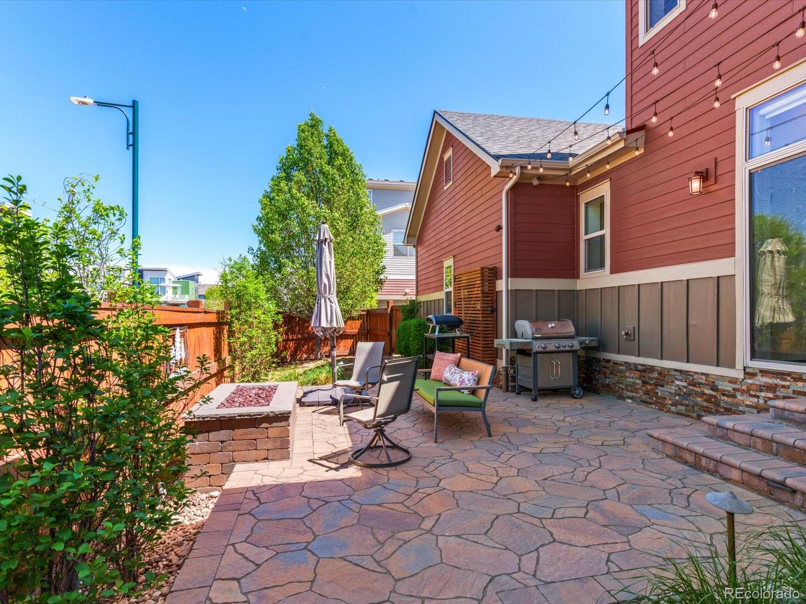 5446 Uinta Way Denver, CO 80238 - Photo 40 of 49 a view of a lounge chairs in a patio