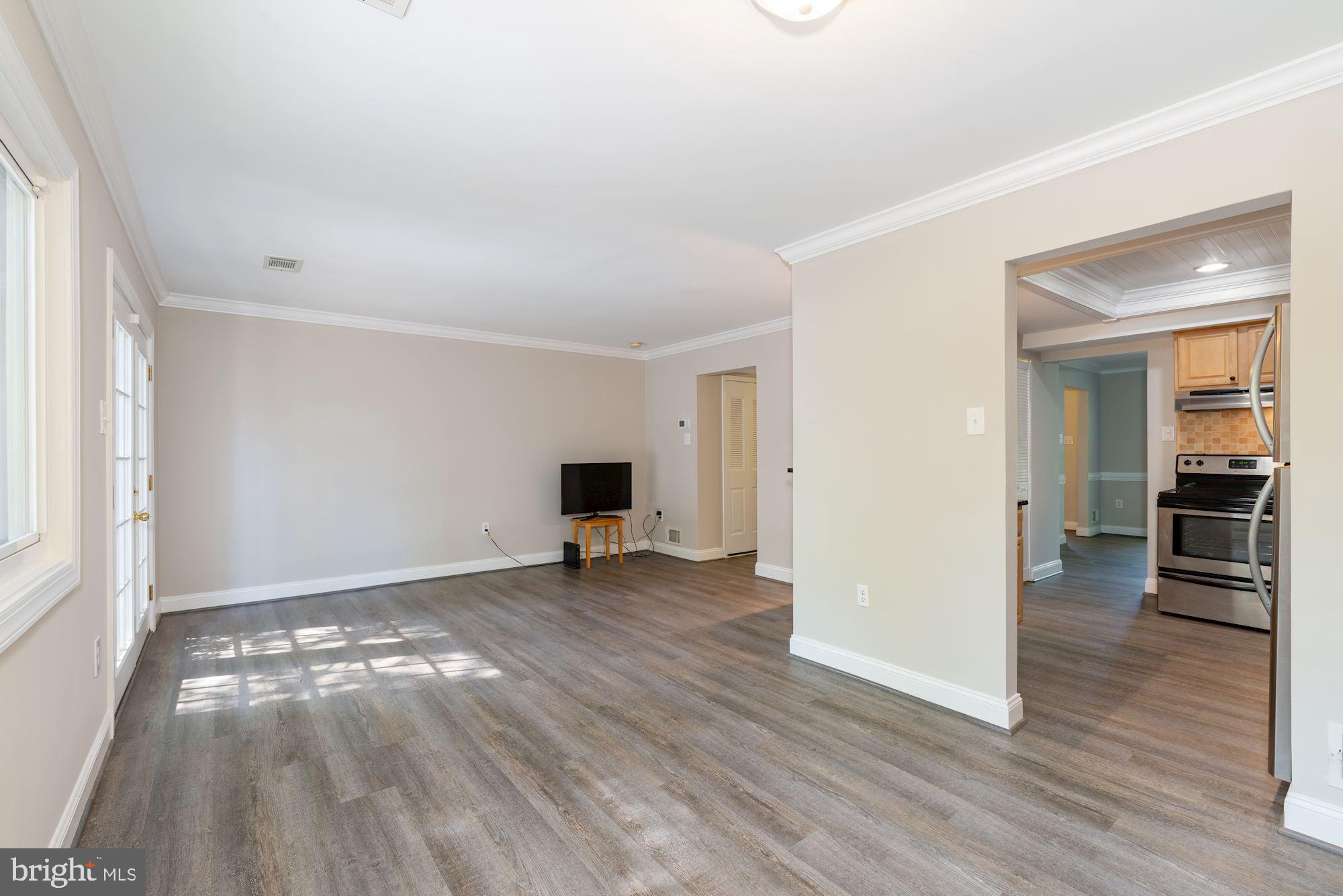 219 North Cottage Road Sterling, VA 20164 - Photo 8 of 21 Big spacious family room odd kitchen