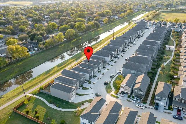 a view of swimming pool with outdoor seating and yard