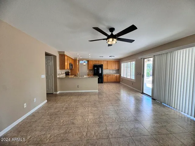 a kitchen with stainless steel appliances granite countertop sink stove and granite counter top