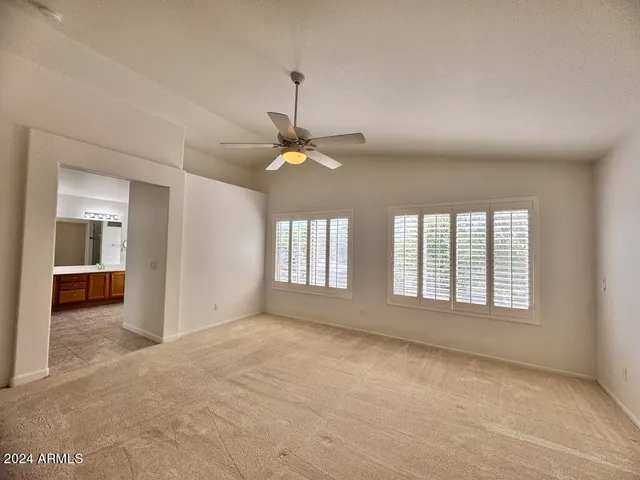 a view of bathroom with bathtub shower and closet