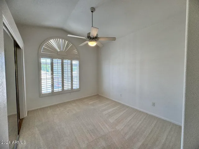 a view of a roof with sitting area