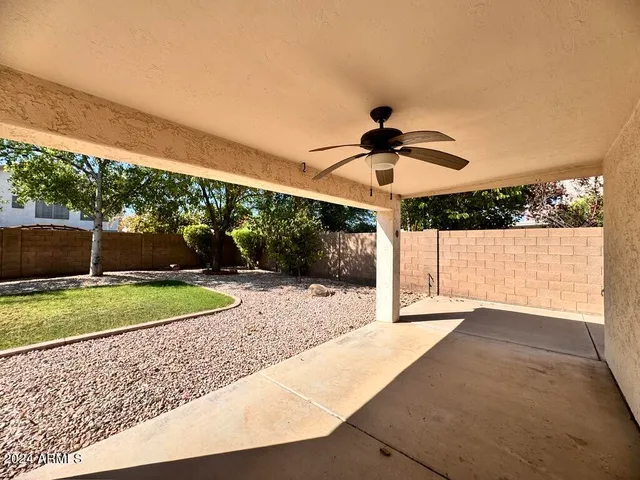 a view of a porch with seating space
