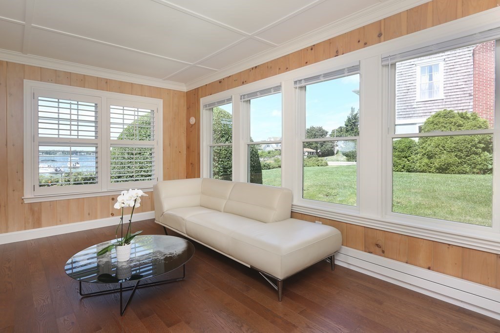 11 Bryant Road Bourne, MA 02532 - Photo 11 of 28 a living room with furniture and a large window