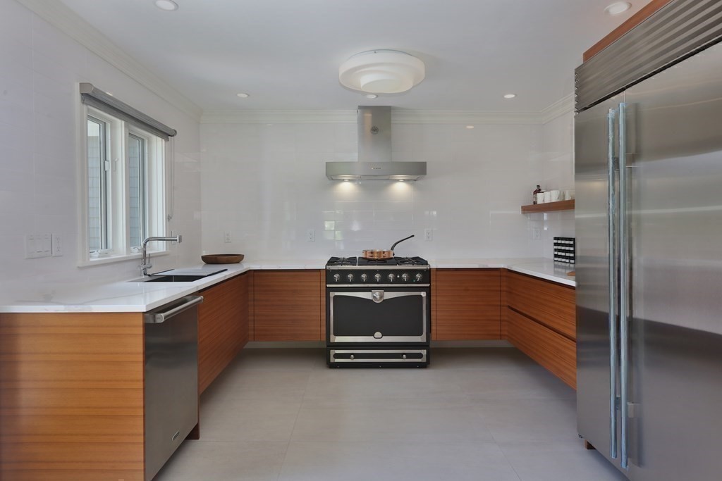 11 Bryant Road Bourne, MA 02532 - Photo 13 of 28 a kitchen with stainless steel appliances a sink and a stove
