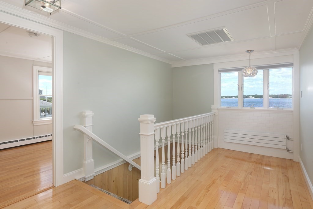 11 Bryant Road Bourne, MA 02532 - Photo 16 of 28 a view of entryway with stairs and wooden floor