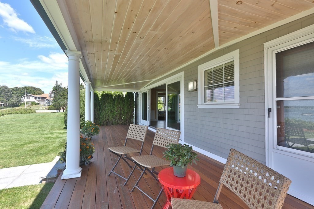 11 Bryant Road Bourne, MA 02532 - Photo 7 of 28 a balcony with furniture and wooden floor