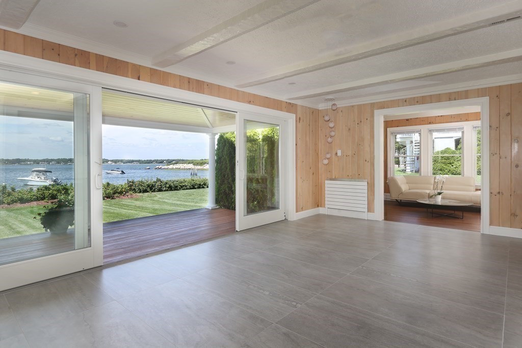11 Bryant Road Bourne, MA 02532 - Photo 10 of 28 a view of an entryway with wooden floor and windows