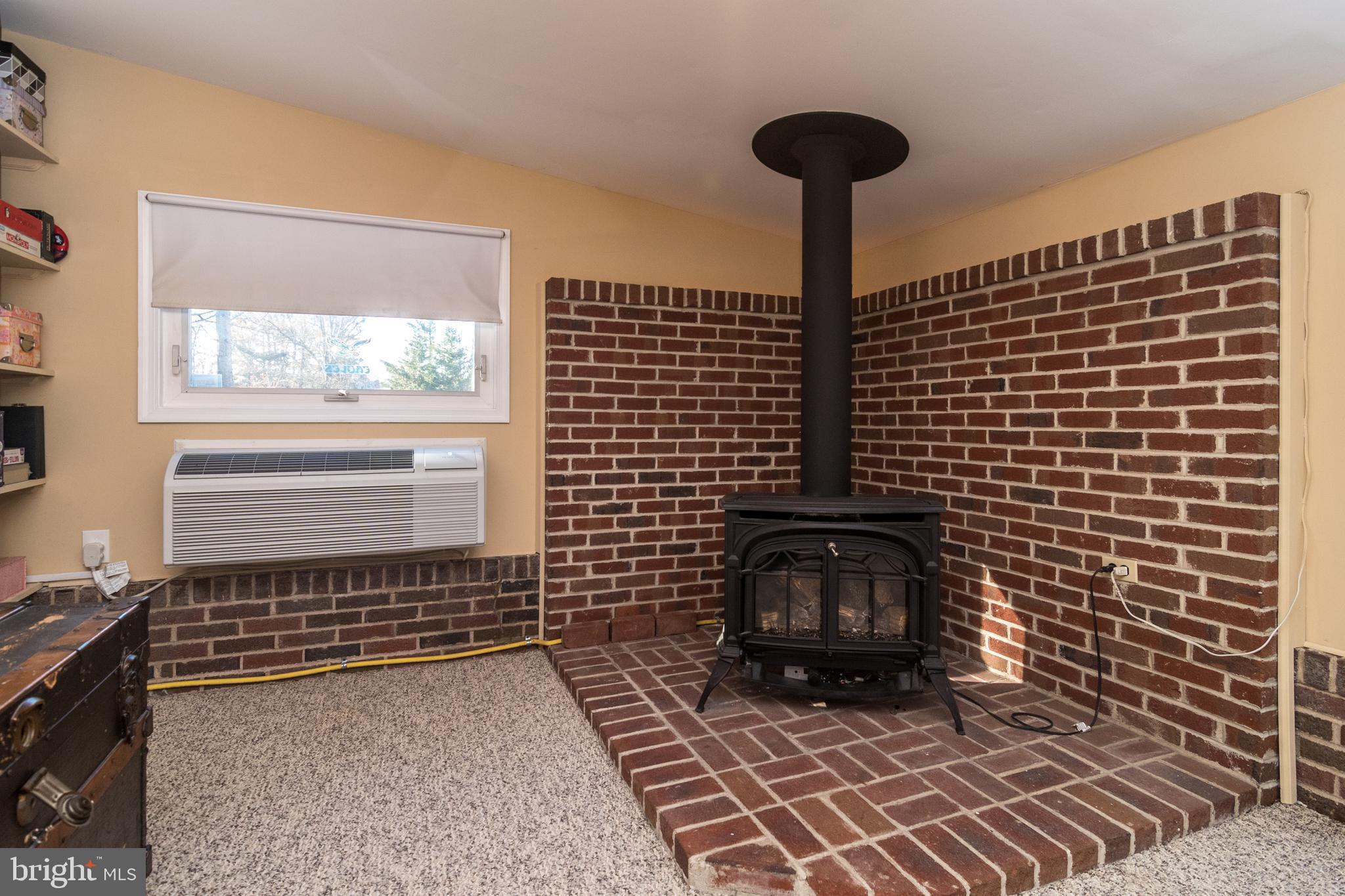 2393 Upper Barness Road Warrington, PA 18976 - Photo 19 of 45 Lower level family room fireplace