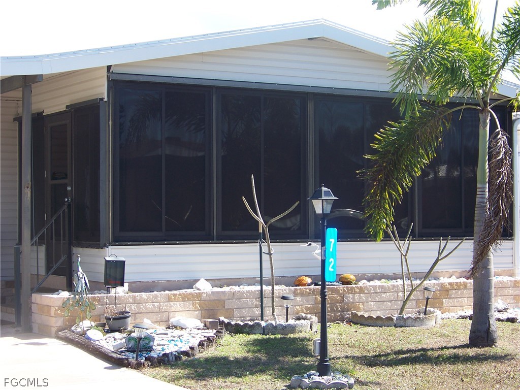 15550 Burnt Store Road, Unit 72 Punta Gorda, FL 33955 - Photo 11 of 50 a backyard of a house