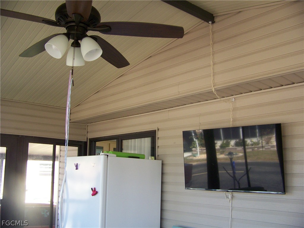15550 Burnt Store Road, Unit 72 Punta Gorda, FL 33955 - Photo 14 of 50 a white refrigerator freezer sitting inside of a kitchen