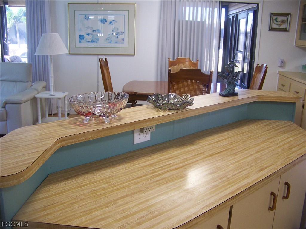 15550 Burnt Store Road, Unit 72 Punta Gorda, FL 33955 - Photo 17 of 50 a view of living room with furniture and lamp