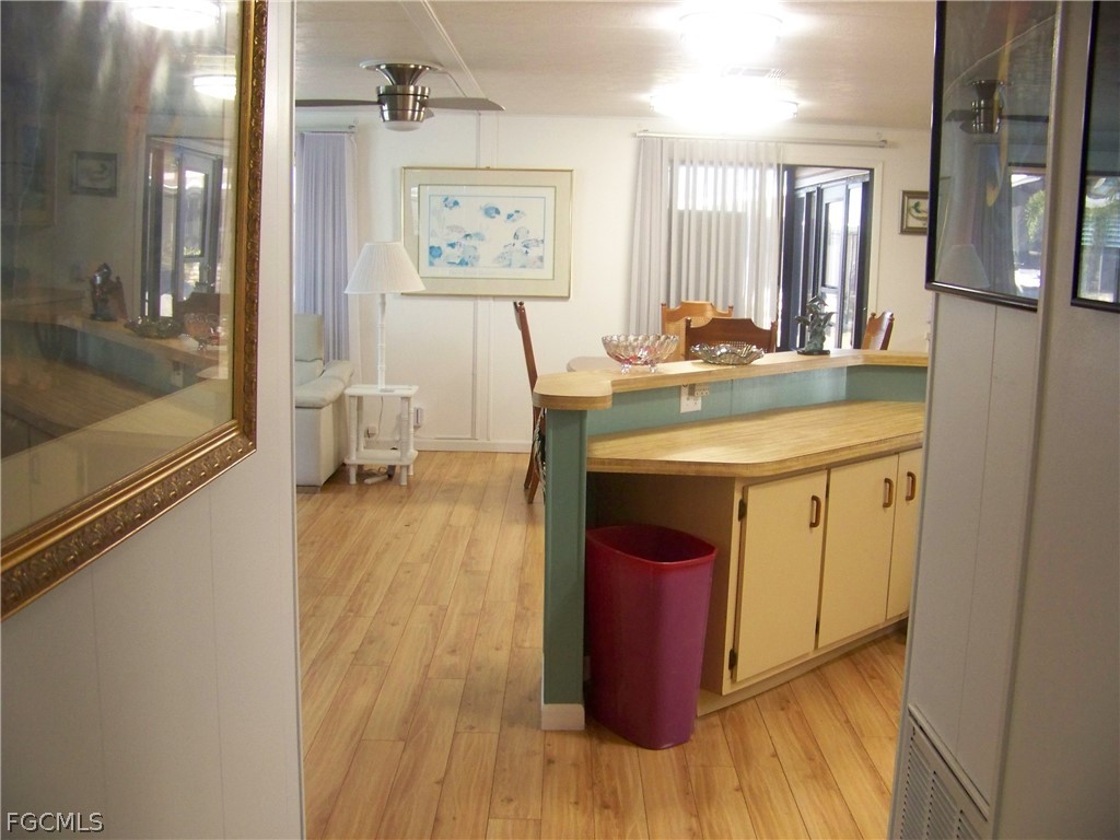 15550 Burnt Store Road, Unit 72 Punta Gorda, FL 33955 - Photo 20 of 50 a kitchen with a sink appliances and cabinets