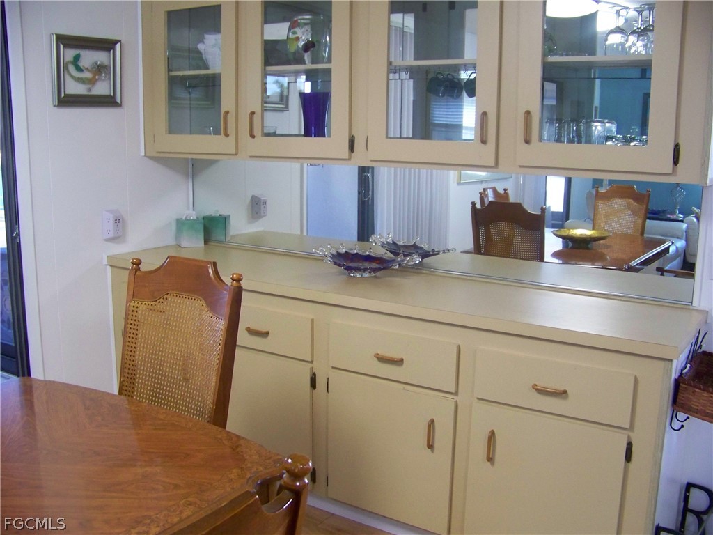15550 Burnt Store Road, Unit 72 Punta Gorda, FL 33955 - Photo 22 of 50 a view of a kitchen with appliances and cabinets