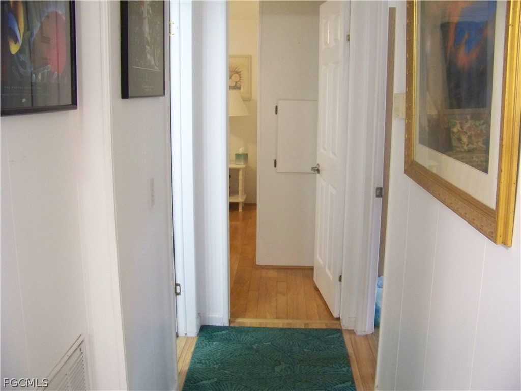 15550 Burnt Store Road, Unit 72 Punta Gorda, FL 33955 - Photo 28 of 50 a view of a hallway with front door