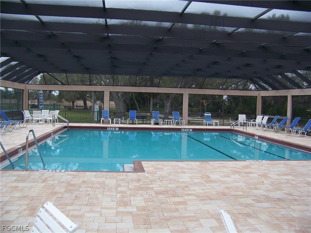 15550 Burnt Store Road, Unit 72 Punta Gorda, FL 33955 - Photo 43 of 50 a view of a swimming pool with a patio