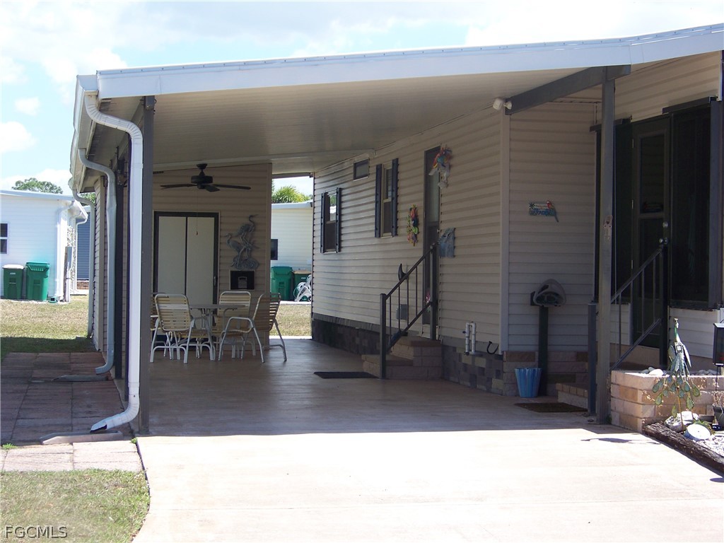 15550 Burnt Store Road, Unit 72 Punta Gorda, FL 33955 - Photo 7 of 50 a view of living room with patio