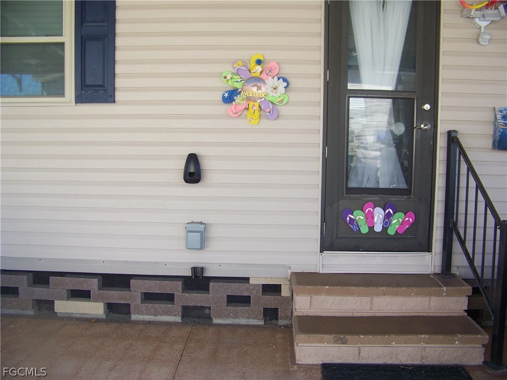 15550 Burnt Store Road, Unit 72 Punta Gorda, FL 33955 - Photo 9 of 50 a view of entryway door front of house