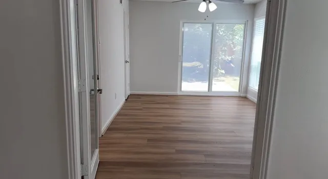 a bathroom with a shower and a toilet