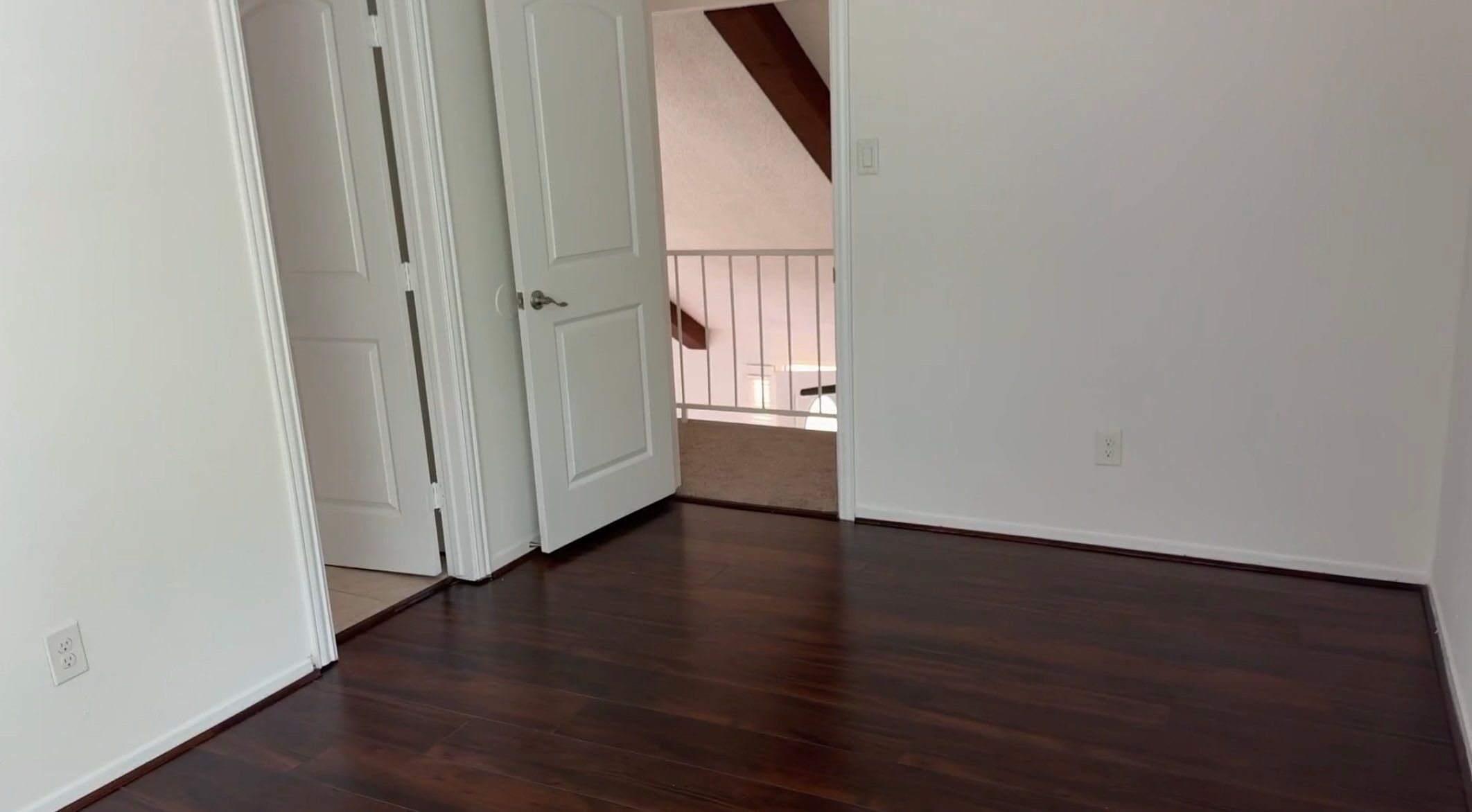 9626 Magnolia Ridge Drive Houston, TX 77070 - Photo 31 of 40 an empty room with wooden floor and windows