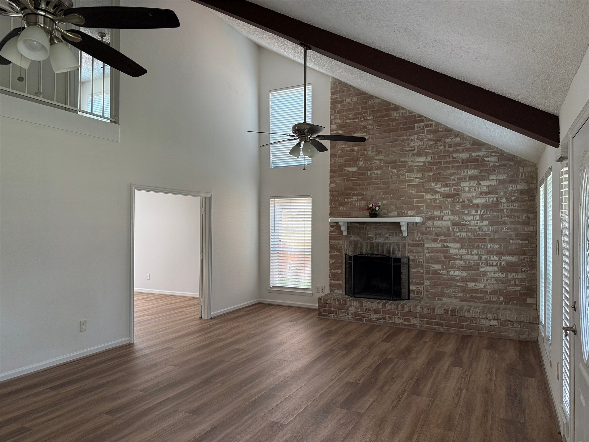 9626 Magnolia Ridge Drive Houston, TX 77070 - Photo 7 of 40 wooden floor fireplace and natural light
