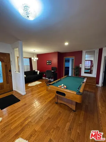 a room with furniture and a wooden floor