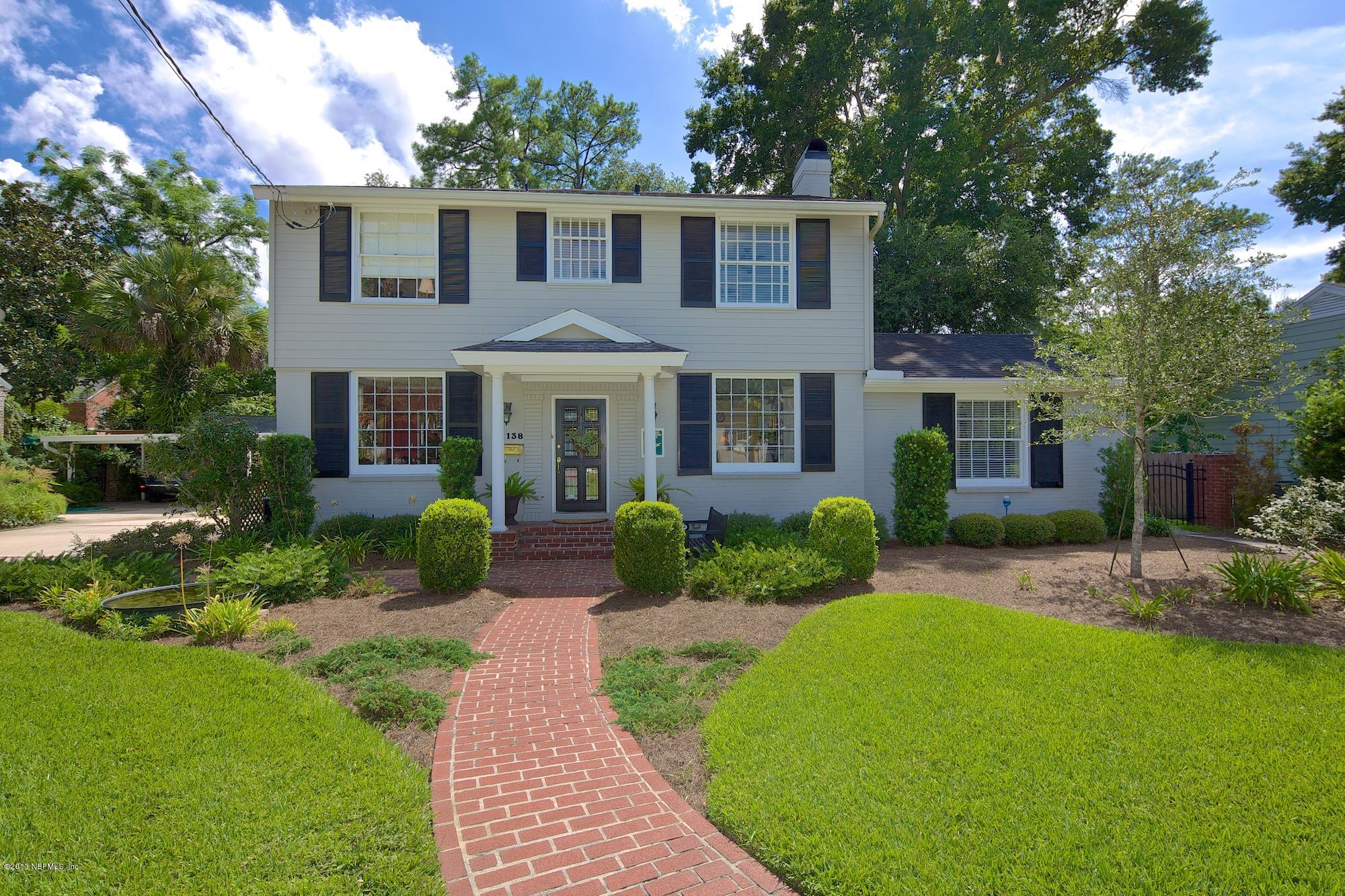 1138 Greenridge Road Jacksonville, FL 32207 - Photo 3 of 36 a front view of a house with a yard and porch