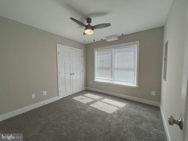 4114 3rd Street, Unit 2 North Beach, MD 20714 - Photo 14 of 24 en empty room with windows and ceiling fan view