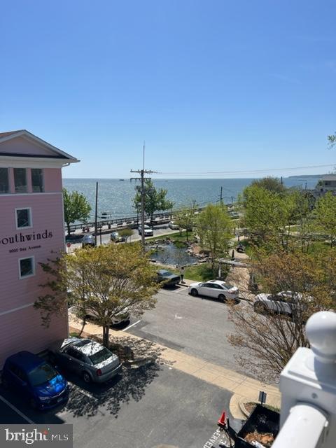 4114 3rd Street, Unit 2 North Beach, MD 20714 - Photo 21 of 24 a view of a street with cars parked