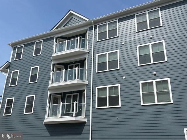 4114 3rd Street, Unit 2 North Beach, MD 20714 - Photo 3 of 24 a front view of residential building