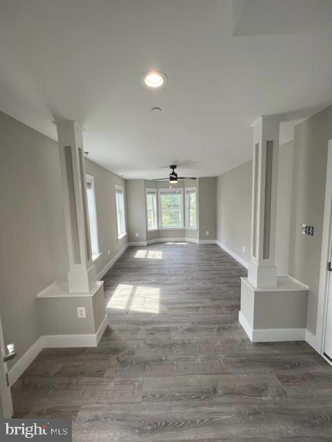 4114 3rd Street, Unit 2 North Beach, MD 20714 - Photo 5 of 24 a view of an empty room with wooden floor and a window